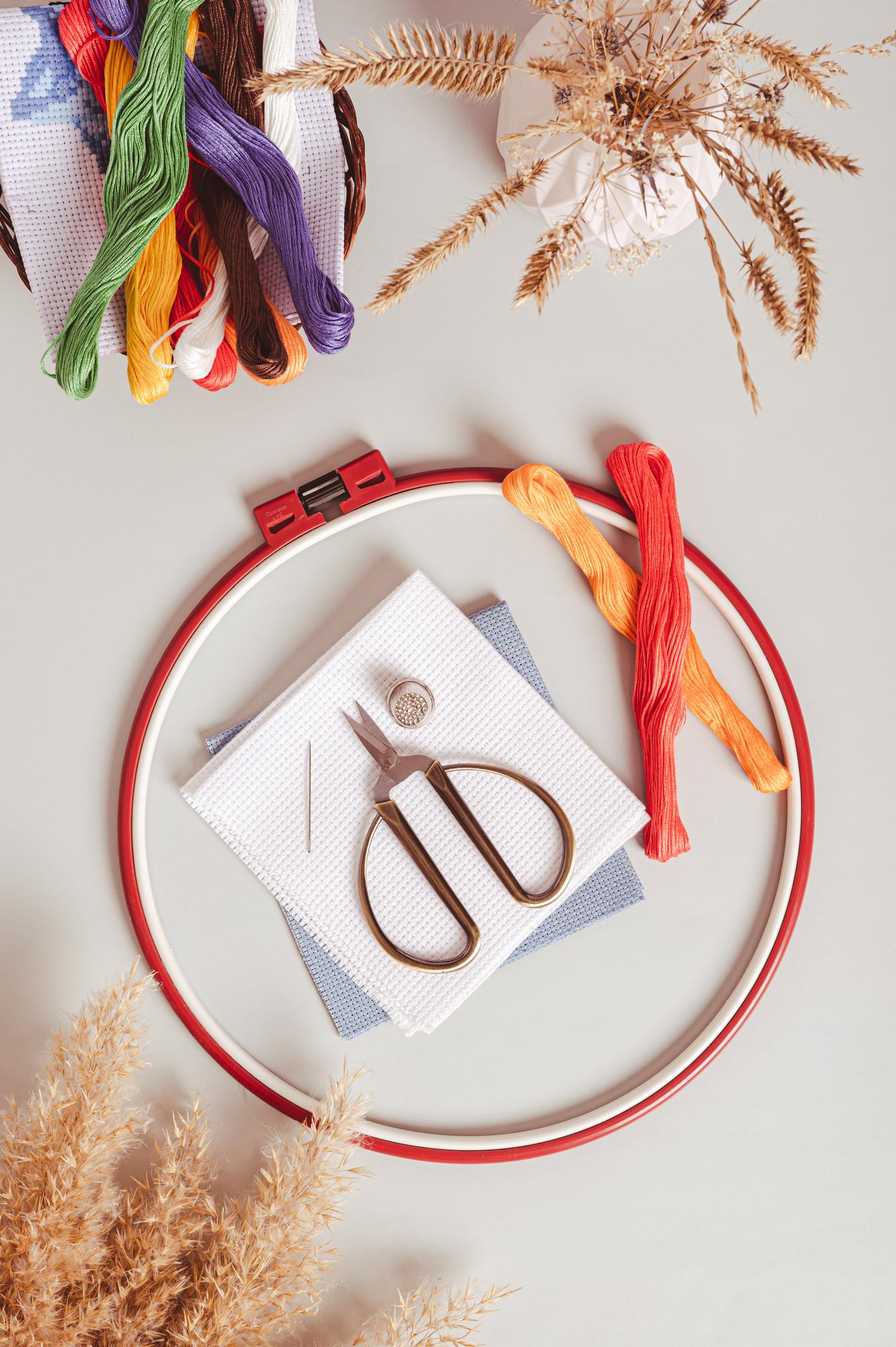 Assorted embroidered samples on a table